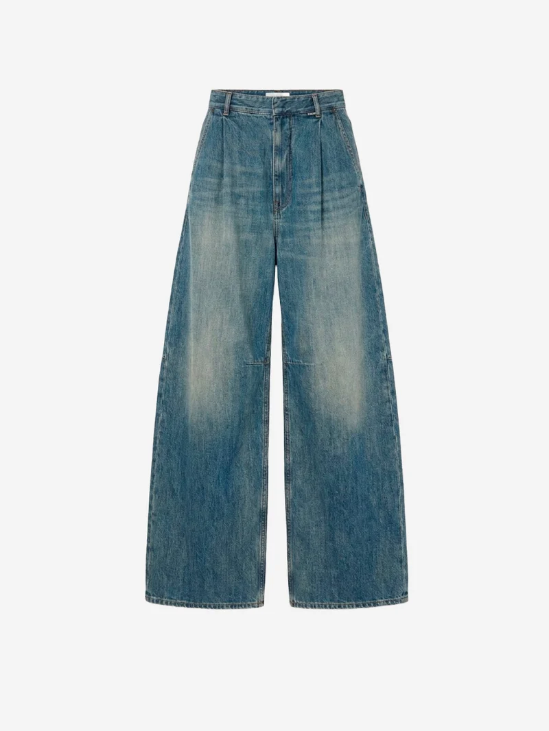 Jeans gamba larga con interruzioni visibili