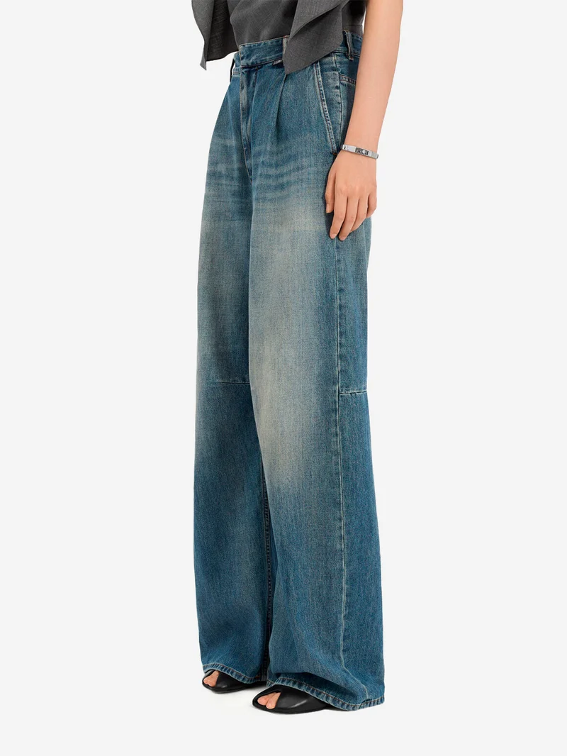 Jeans gamba larga con interruzioni visibili