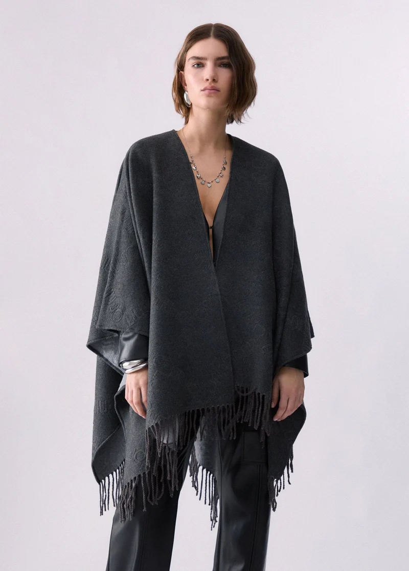 Poncho with embossed logo