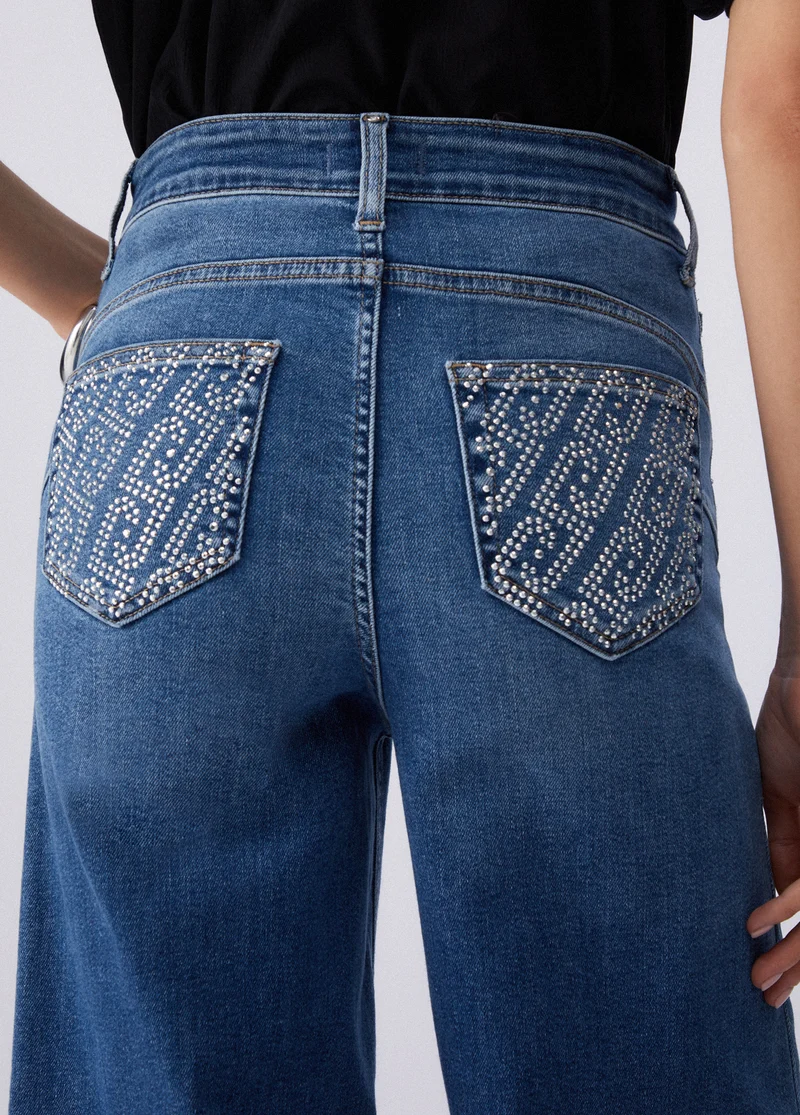 Flared jeans with rhinestones