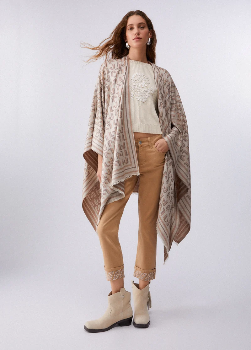 Poncho with Jacquard Logo