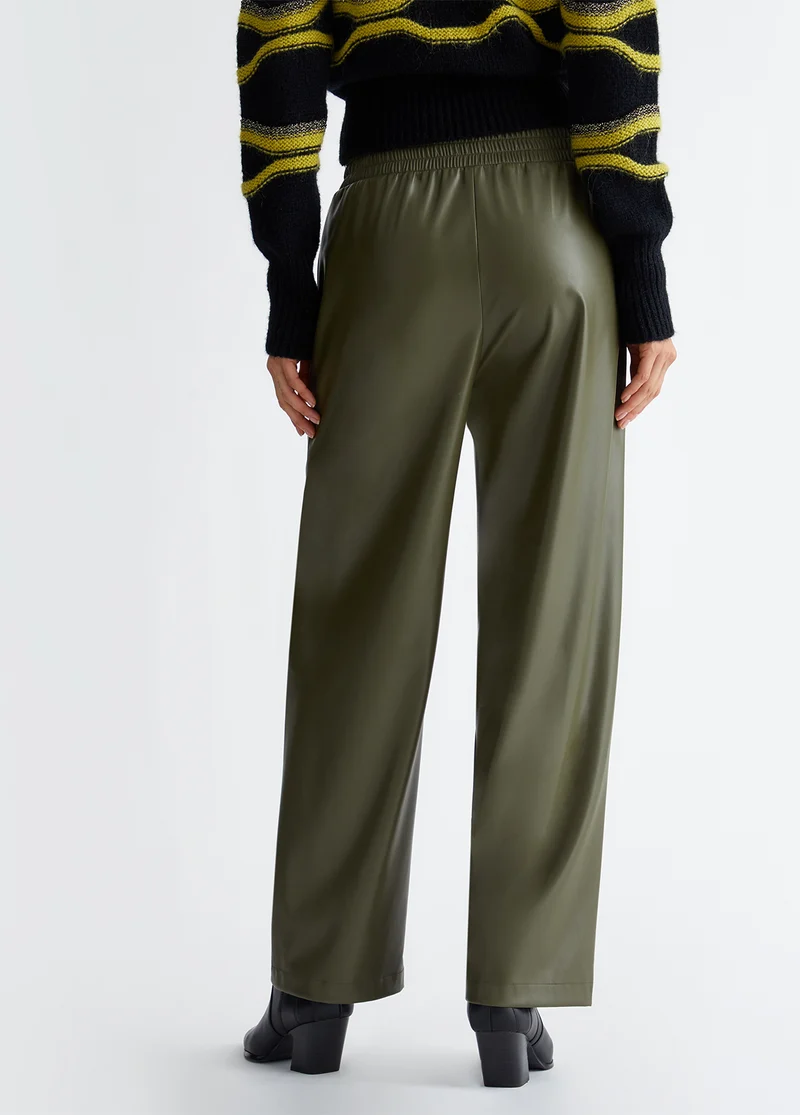 Jogging trousers in coated fabric