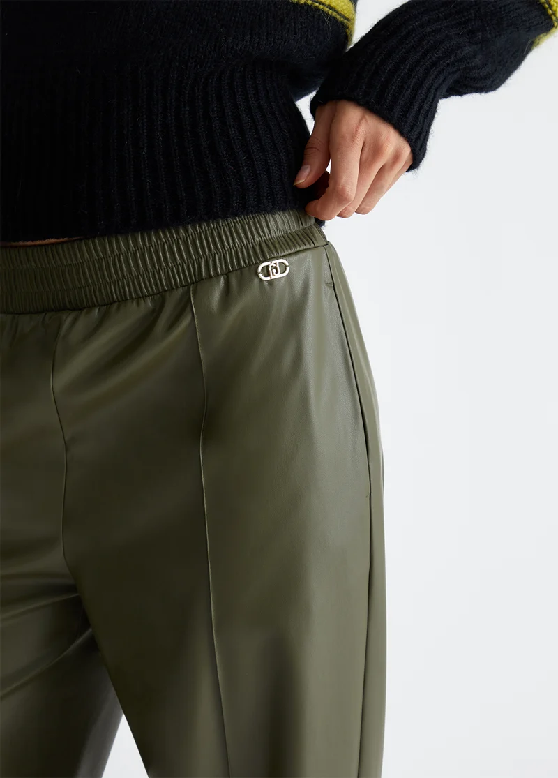 Jogging trousers in coated fabric