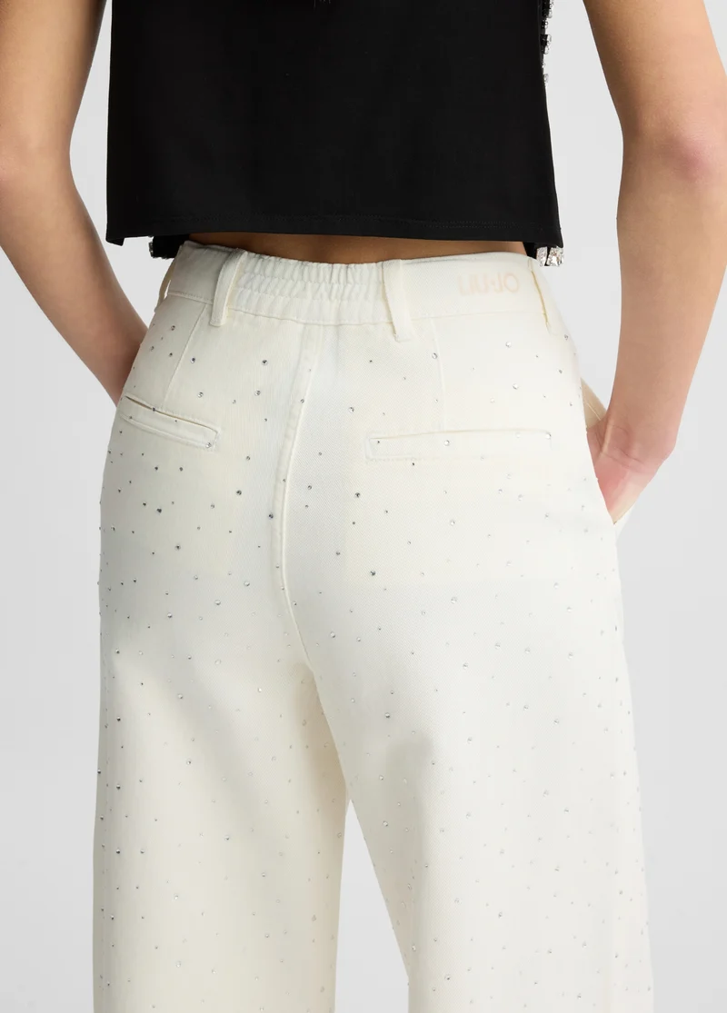 Flared jeans with rhinestones