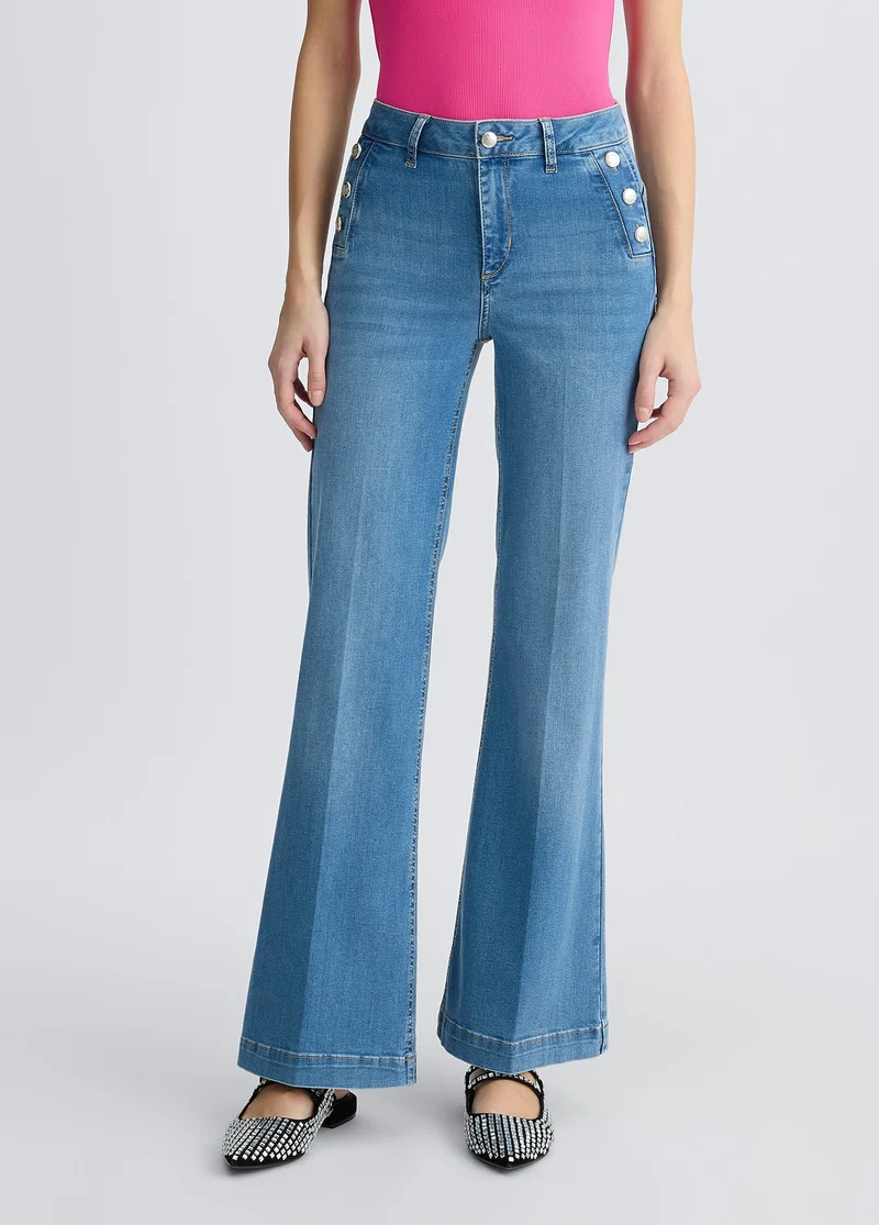 Flared jeans with buttons