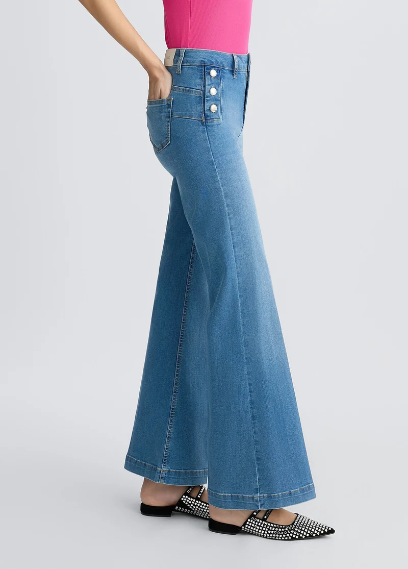Flared jeans with buttons
