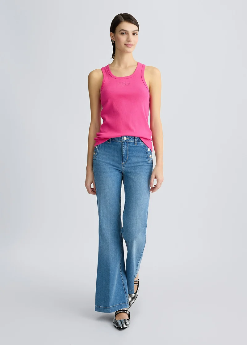 Flared jeans with buttons