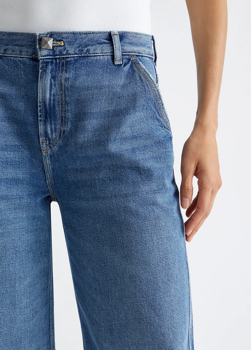 Flared jeans with studs
