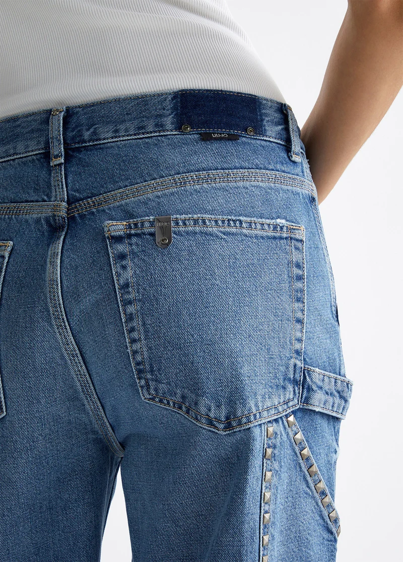 Flared jeans with studs