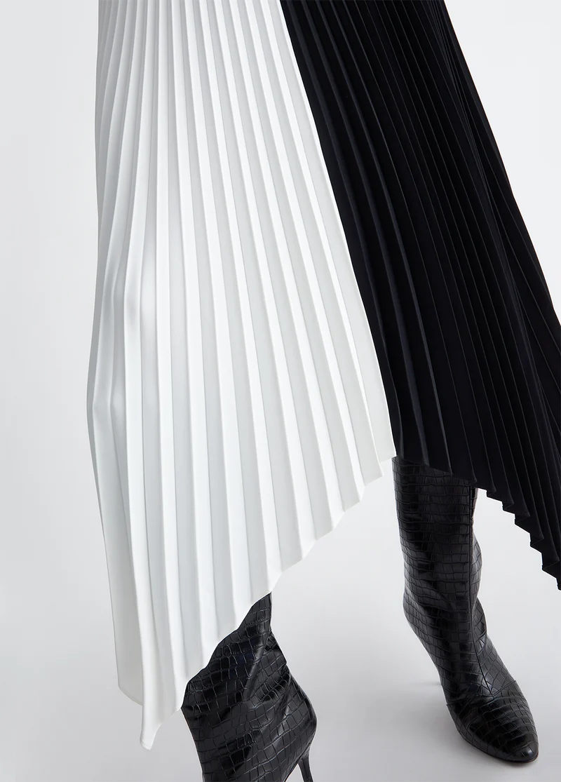 Pleated asymmetrical skirt