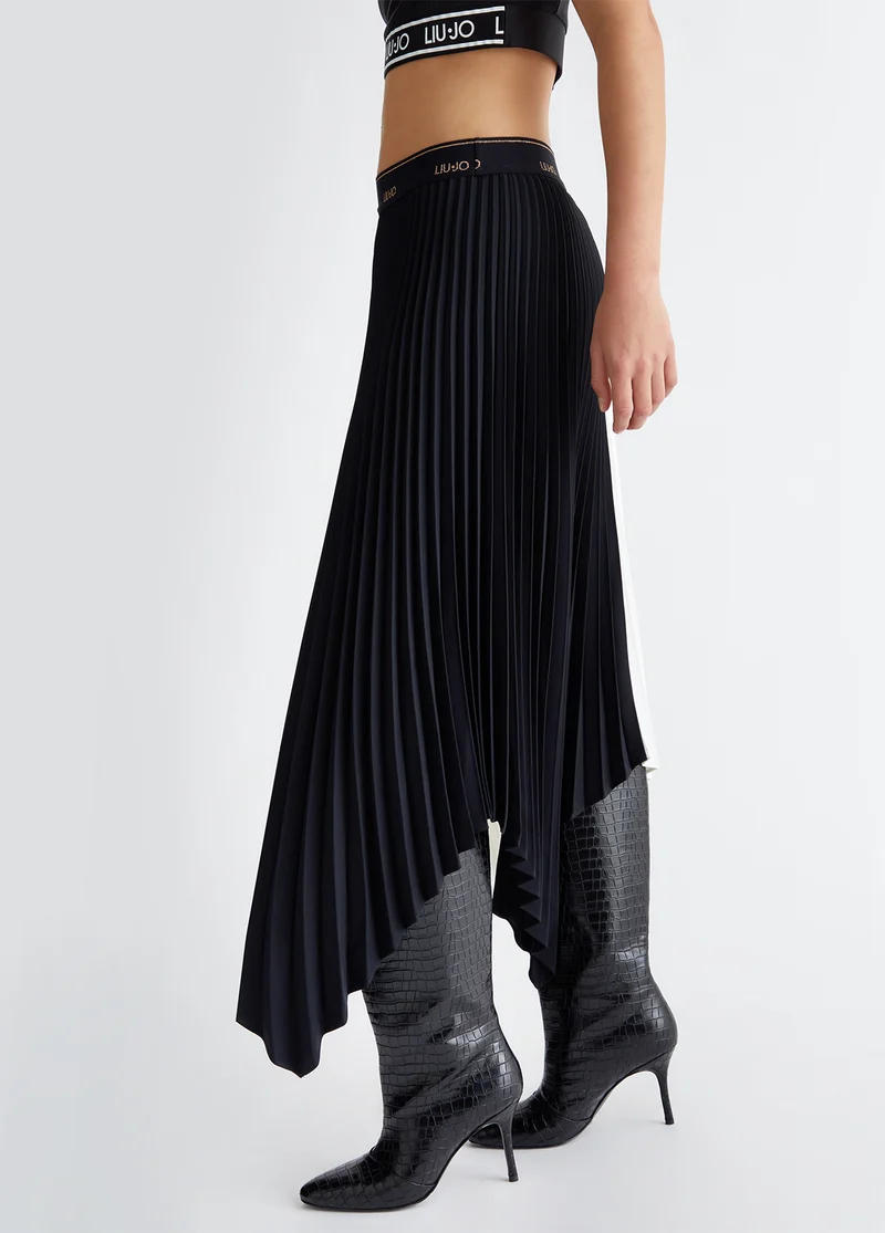 Pleated asymmetrical skirt