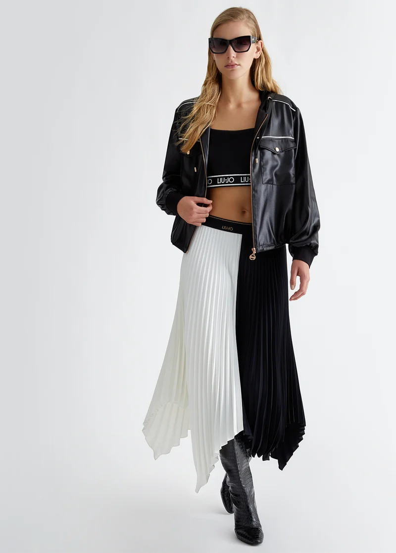 Pleated asymmetrical skirt