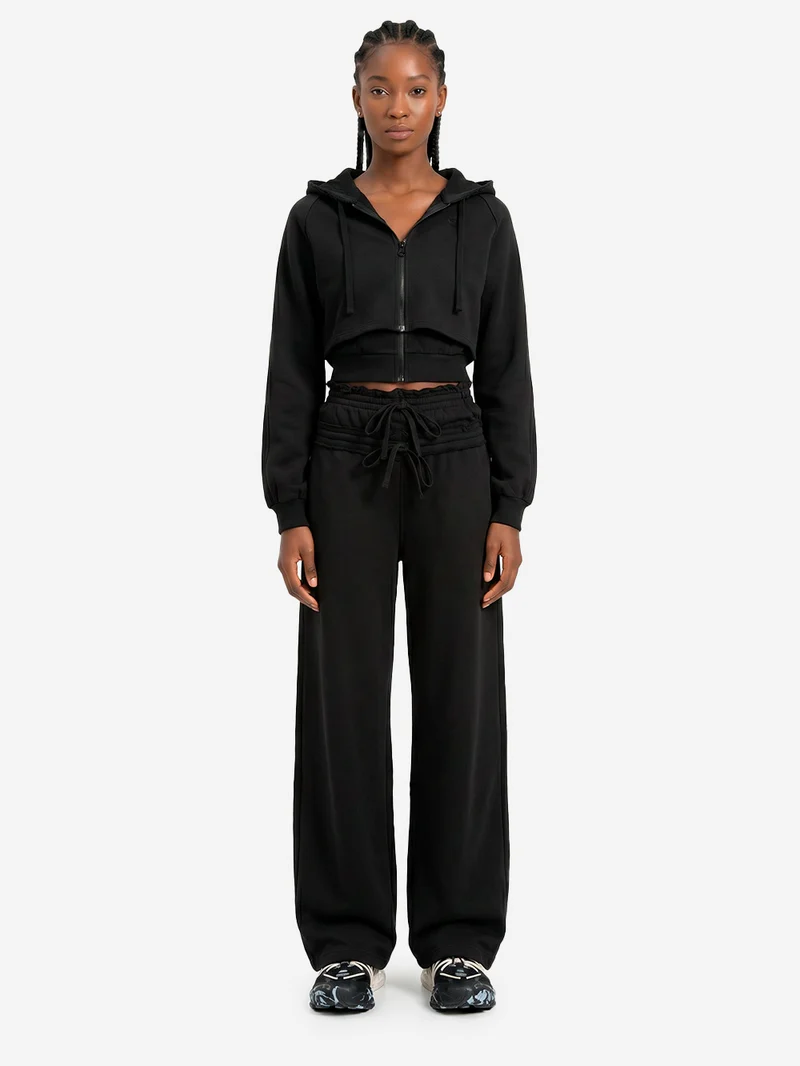 Pantaloni neri in French Terry con doppio girovita