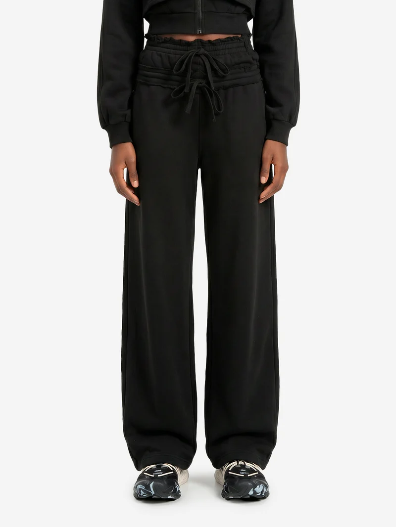 Pantaloni neri in French Terry con doppio girovita