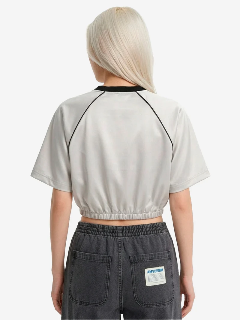 T-shirt oversize grigia in raso con maniche raglan
