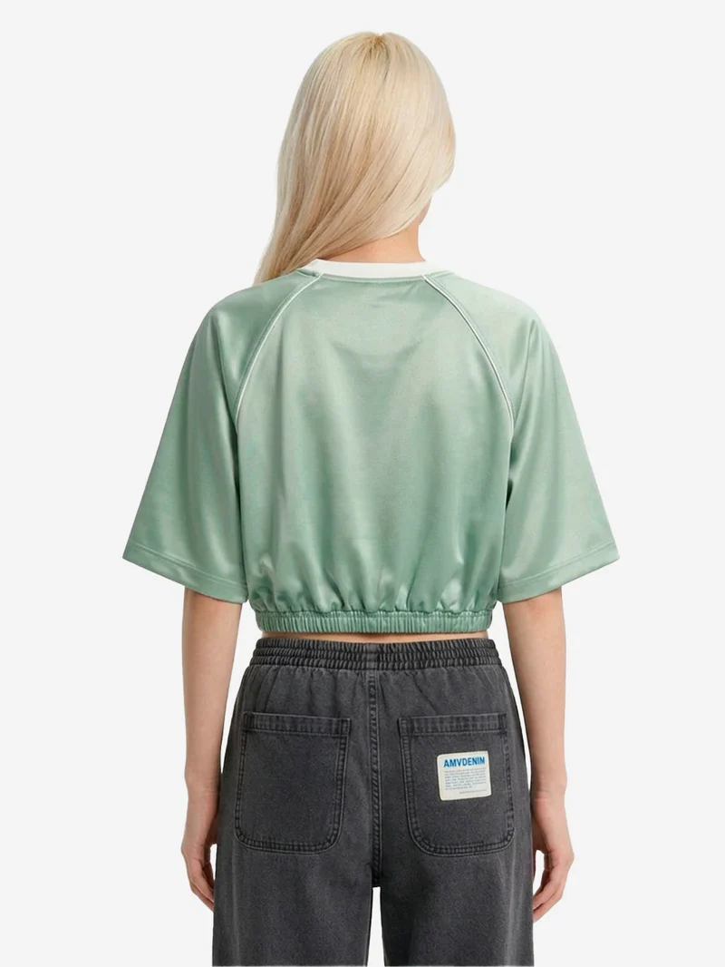 T-shirt oversize verde in raso con maniche raglan