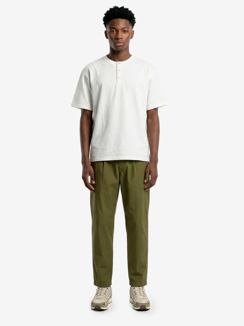 Pantaloni verdi con piega frontale e coulisse