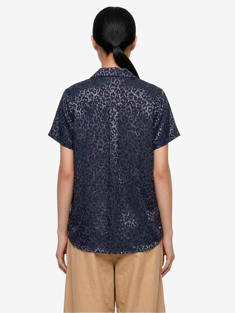 Blusa stile cowboy con maniche francesi e jacquard pitonato blu