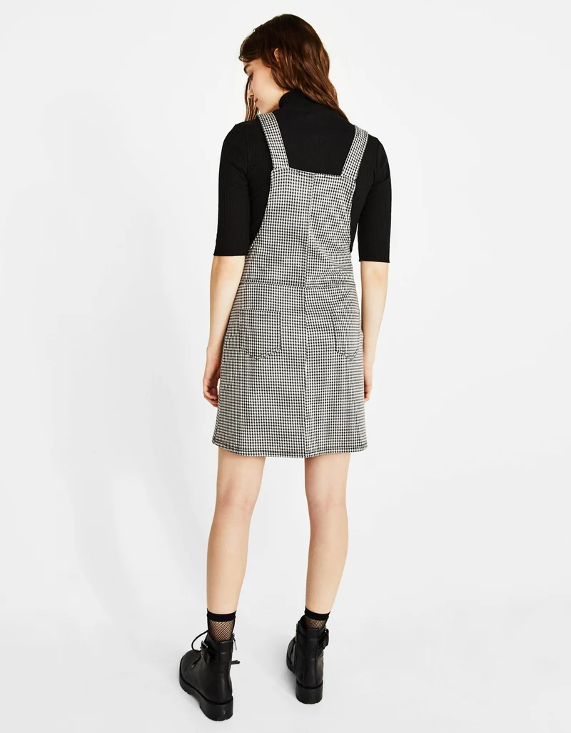 Short dungarees with pockets