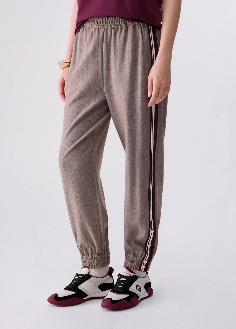 Jogging pants with side tape