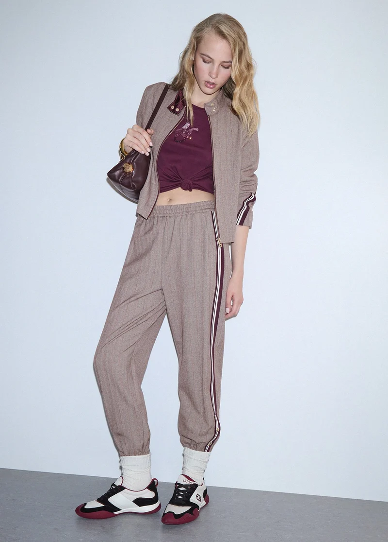 Jogging pants with side tape