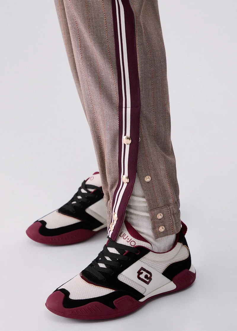 Jogging pants with side tape
