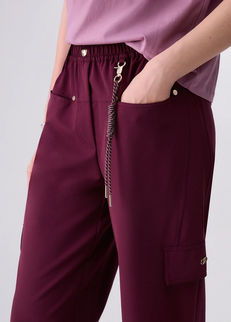 Oversized trousers with charm