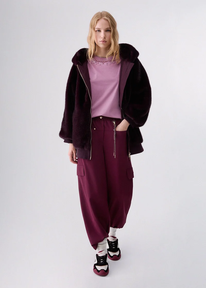 Oversized trousers with charm