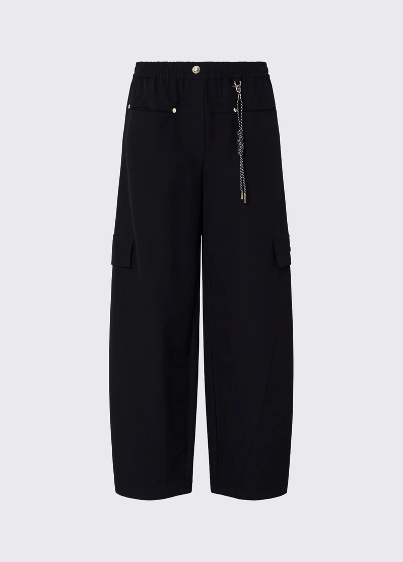 Oversized trousers with charm