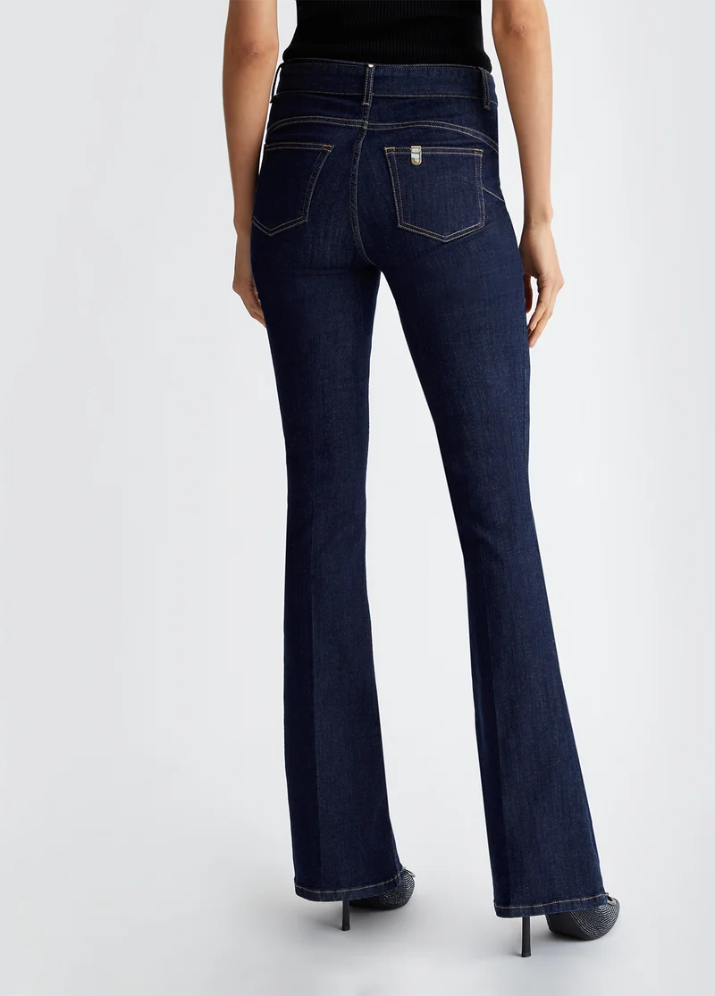 Flared jeans with belt