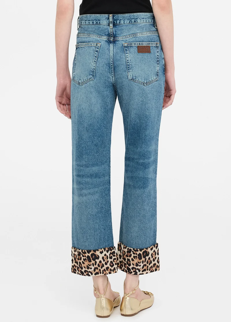 Jeans with animal-print turn-ups