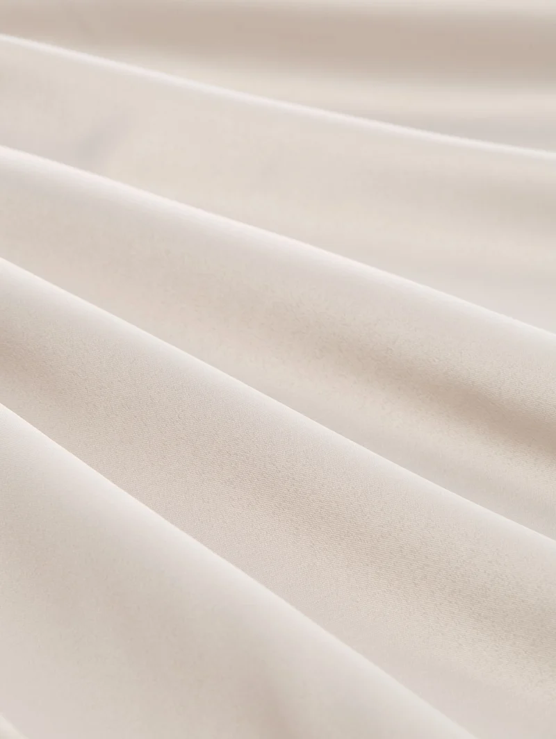 feminine blouson, sand stone beige