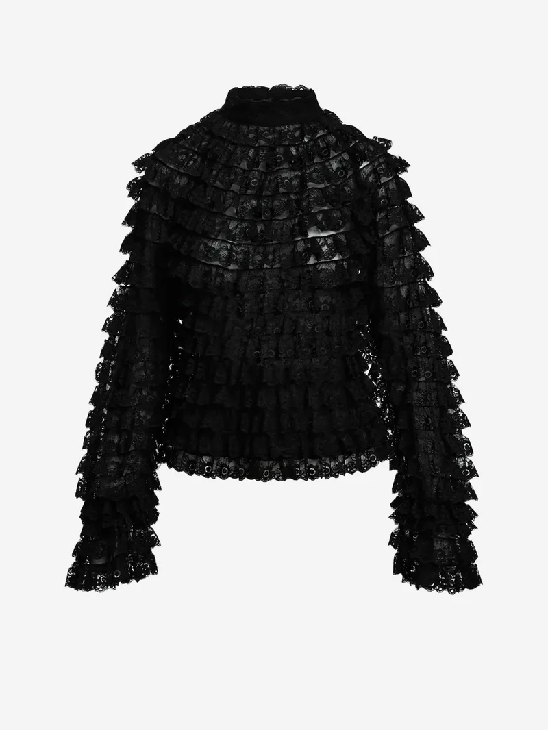 Maglia in pizzo nero con volant a strati