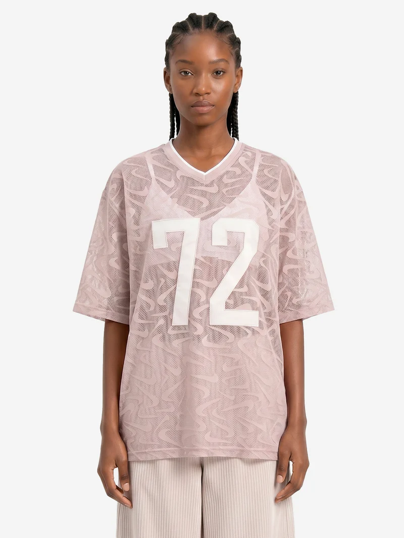Maglia oversize in mesh a trama aperta con grafica
