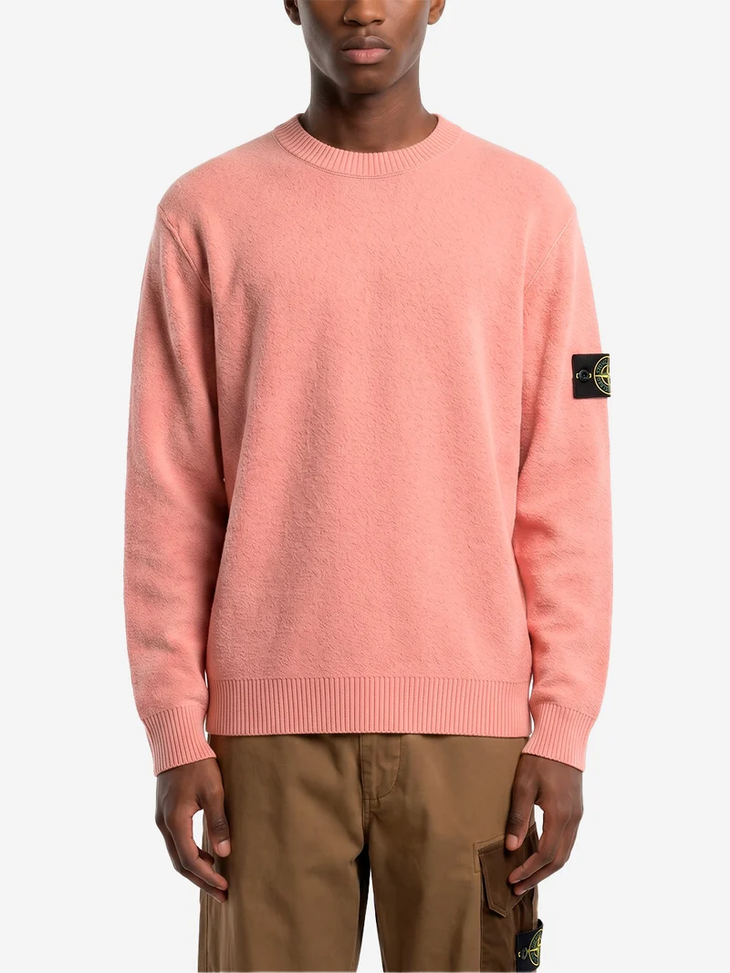 Maglione girocollo rosa in lana con finiture a costine