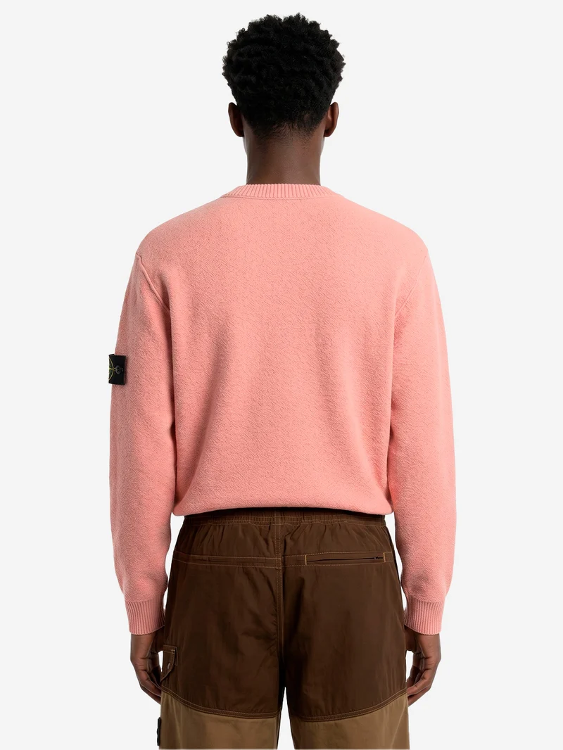 Maglione girocollo rosa in lana con finiture a costine
