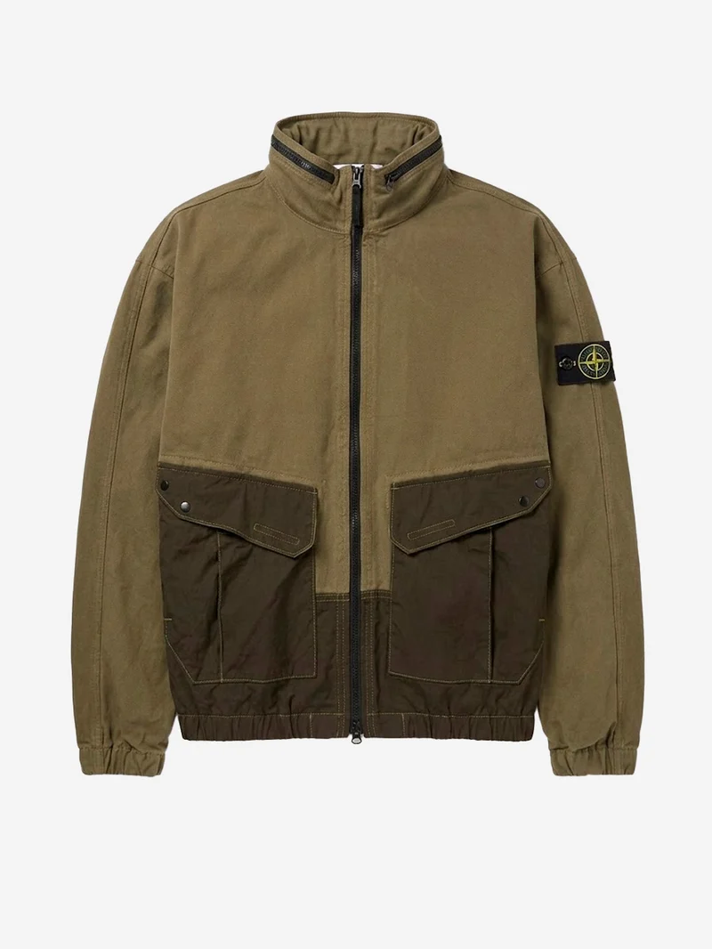 Giacca verde militare in cotone con inserti in nylon e logo patch