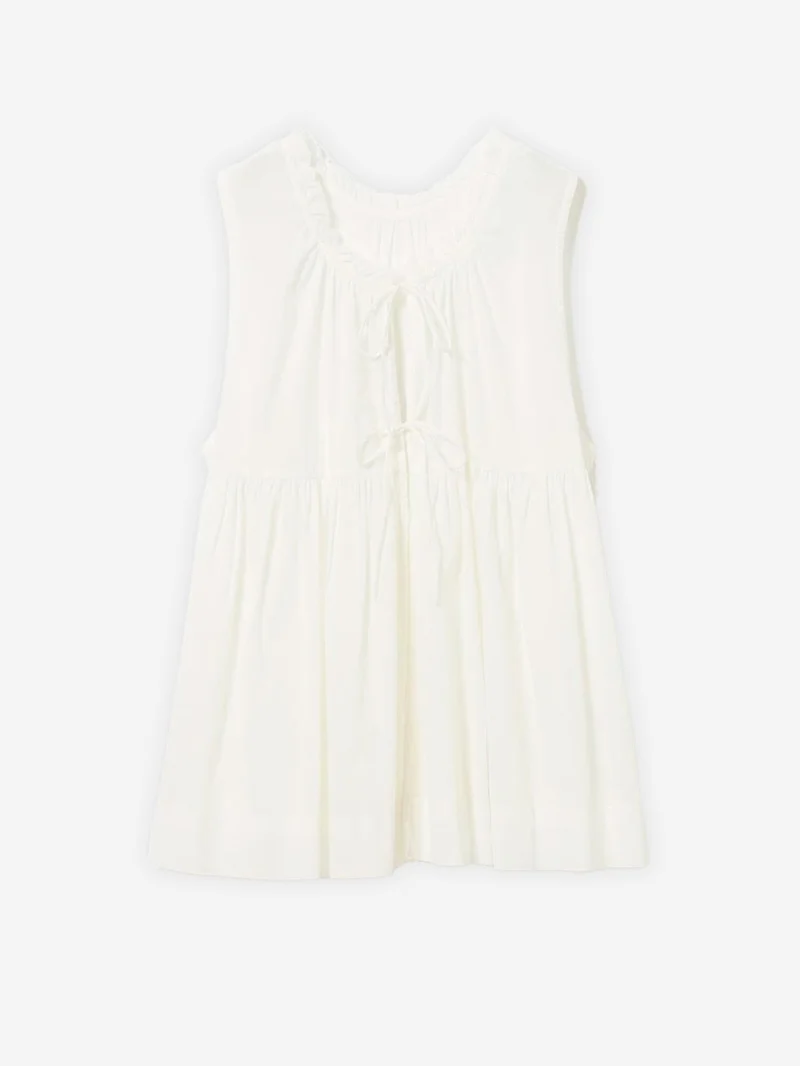 Camicia senza maniche bianca in sheer di cotone con lacci e pieghe