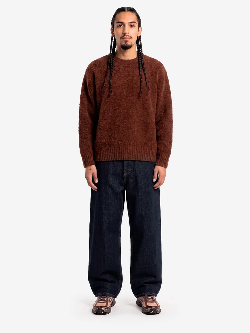 Pantaloni blu wide in denim cimosato