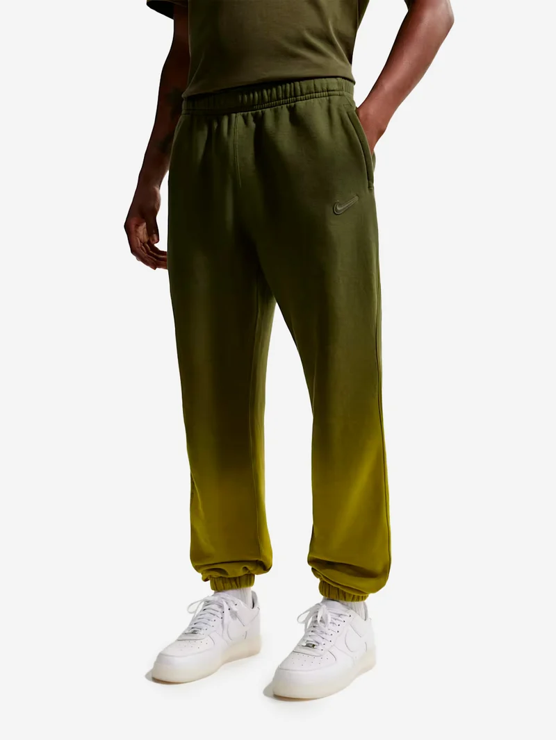 Pantaloni fleece verdi CS Nocta x Drake con elastico alla caviglia