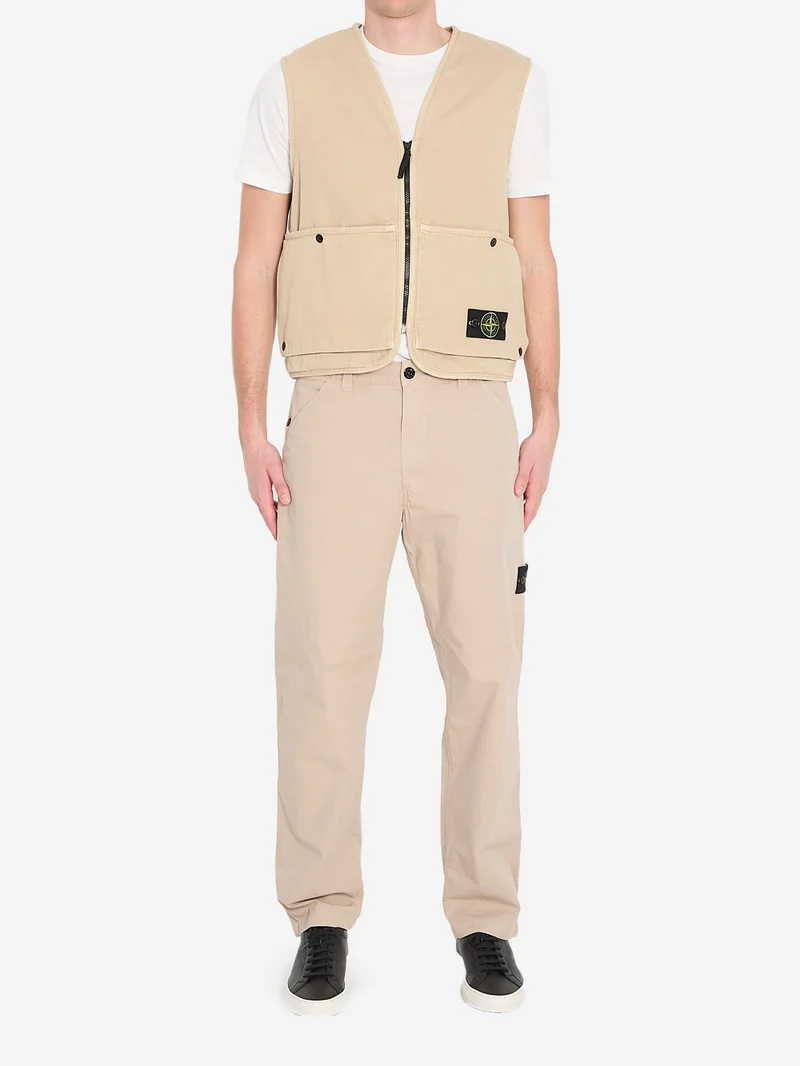 Gilet beige con zip e tasche e badge