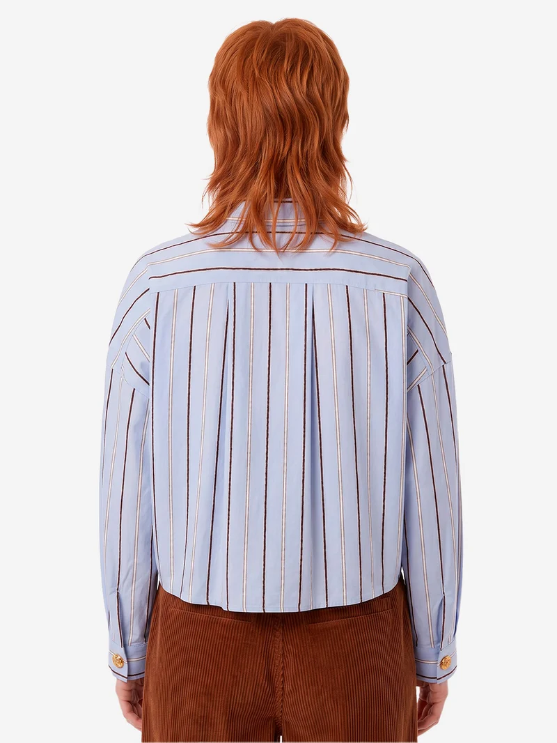 Camicia celeste a righe con tasche e bottoni gioiello