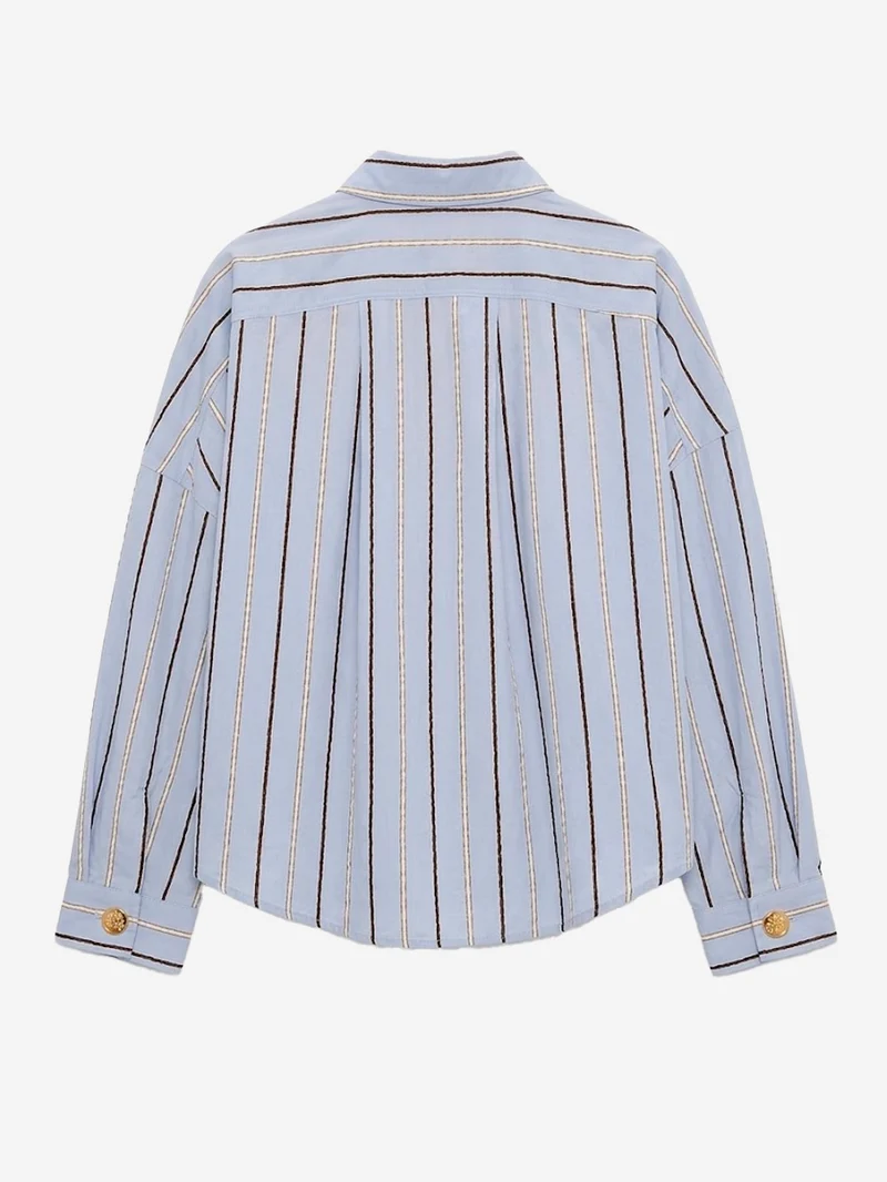 Camicia celeste a righe con tasche e bottoni gioiello