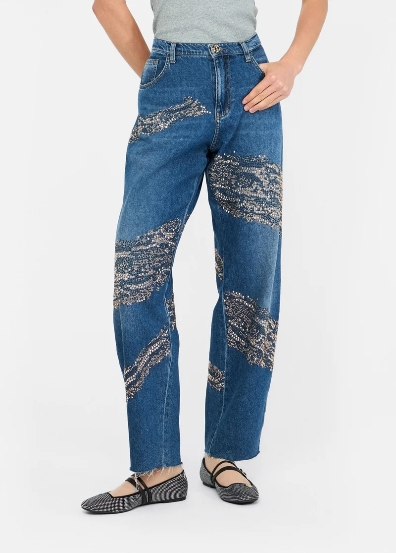 Balloon jeans with studs and gemstones