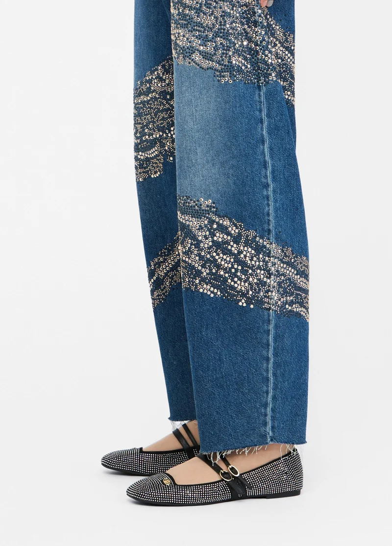 Balloon jeans with studs and gemstones