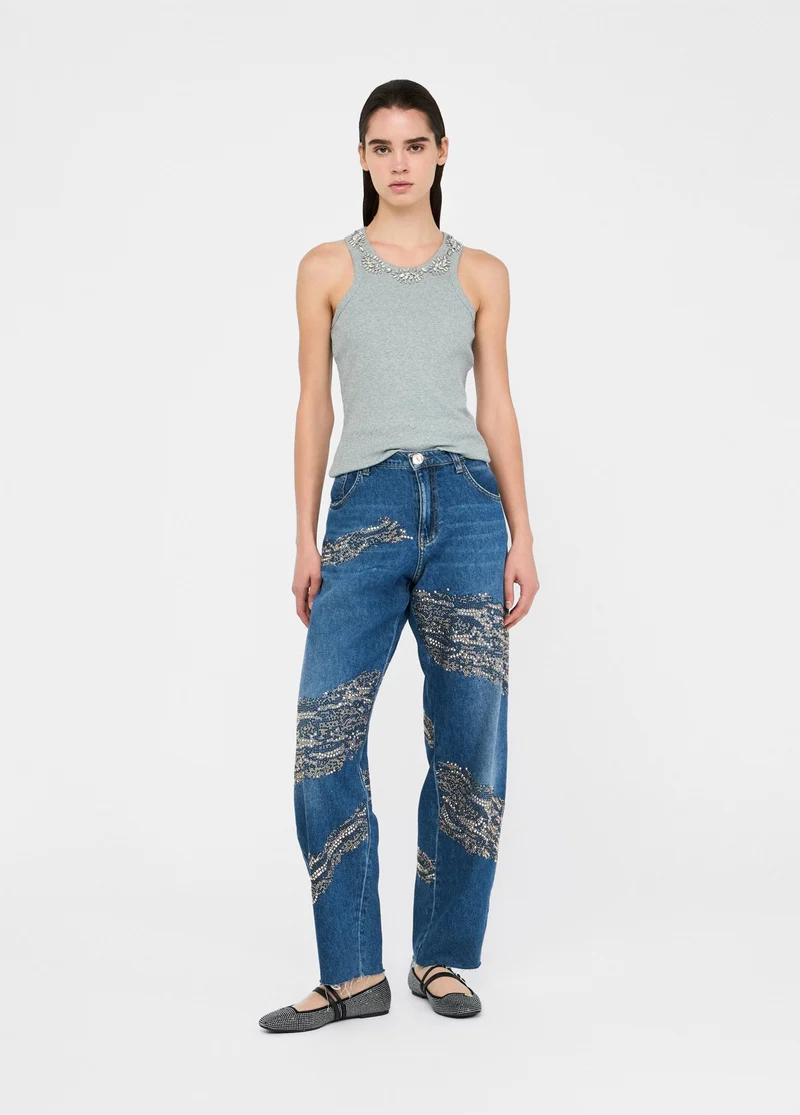 Balloon jeans with studs and gemstones