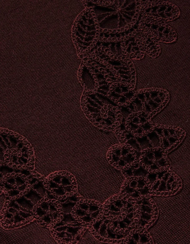 Woll-Pullover mit Häkelspitze