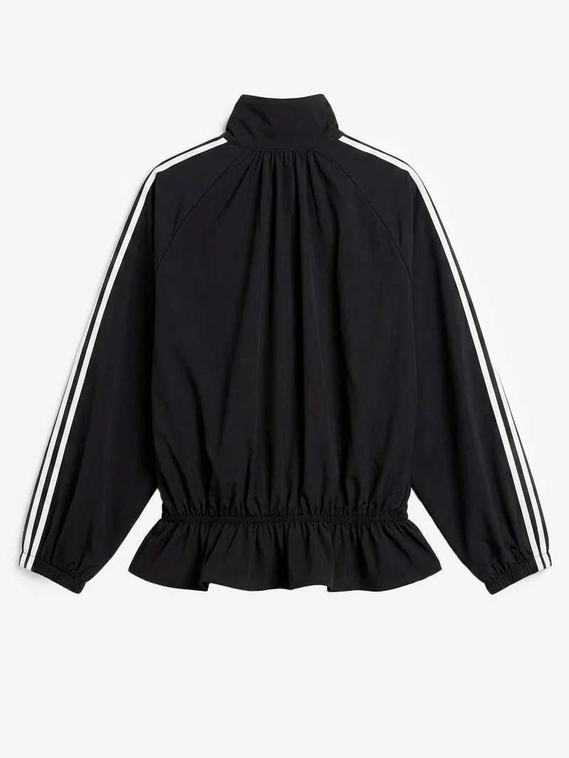 Giacca oversize Blousy nera con balze sull'orlo