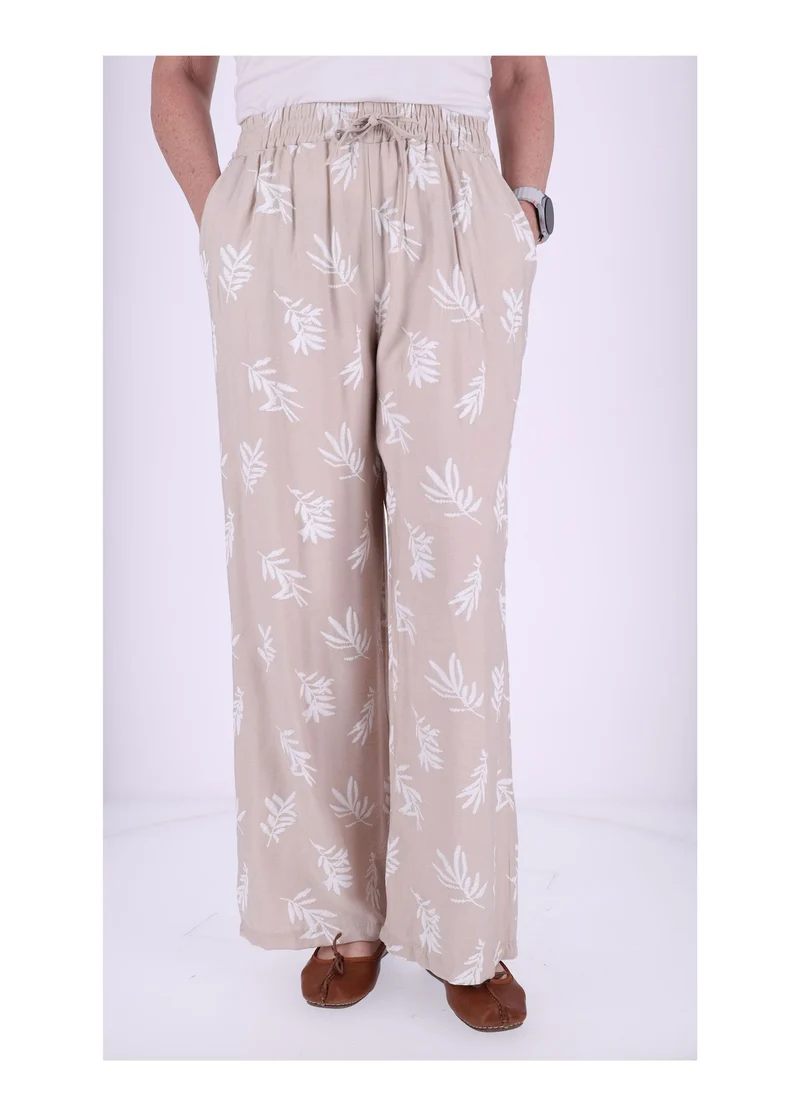 Damen Schlupfhose mit Palmwedel-Print – Beige