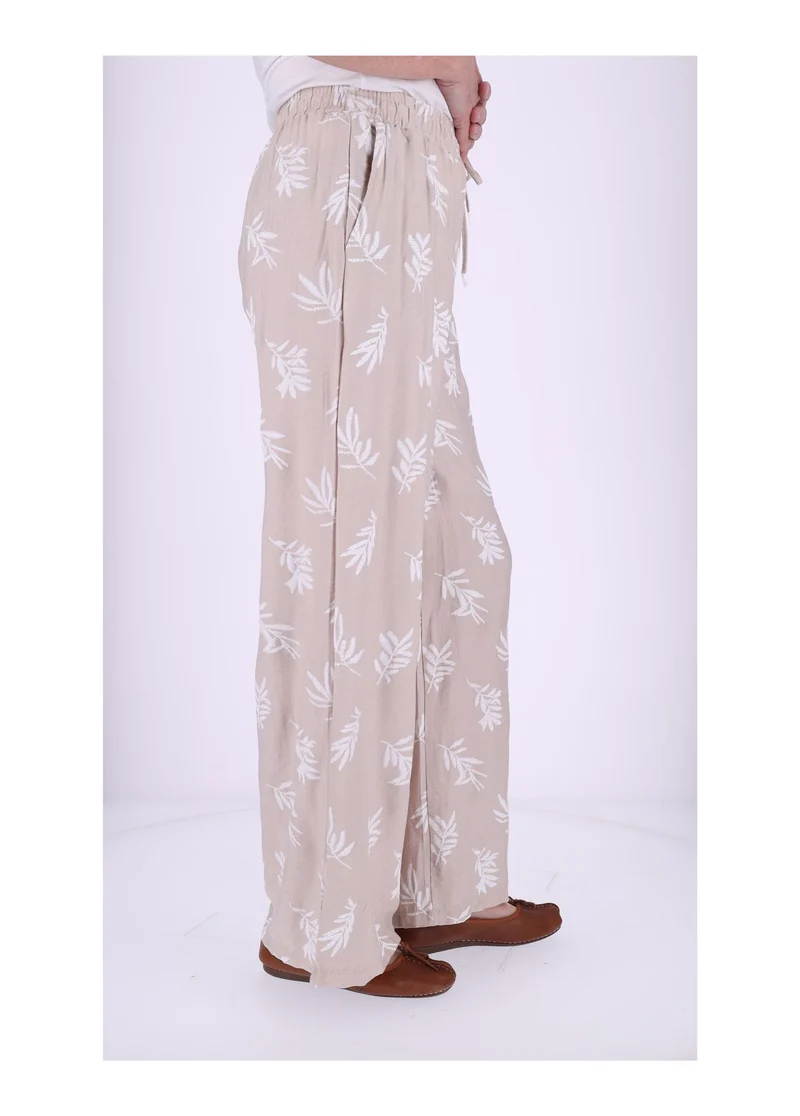 Damen Schlupfhose mit Palmwedel-Print – Beige